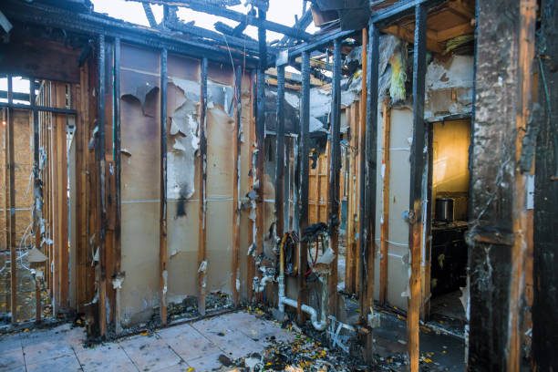 Professional Fire Damage Repair technician working in Highland Beach, FL